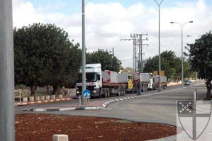 [Trucks arriving at a Beth...]