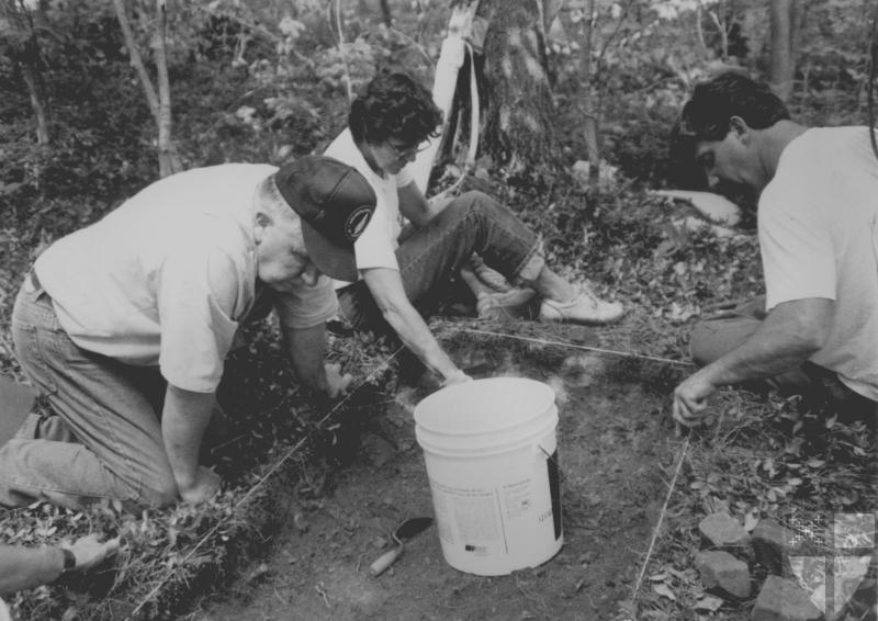 [Archaeological team exami...]