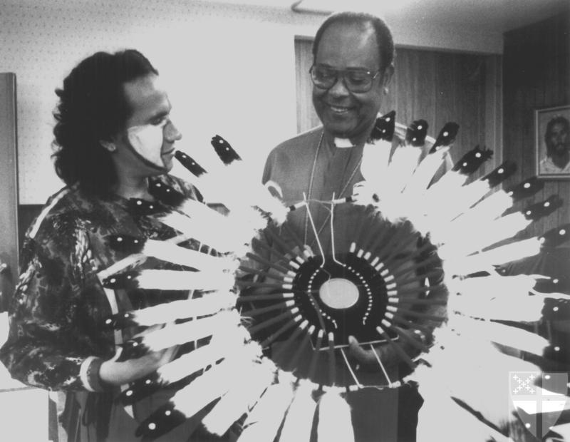[Bishop Examines Headdress...]