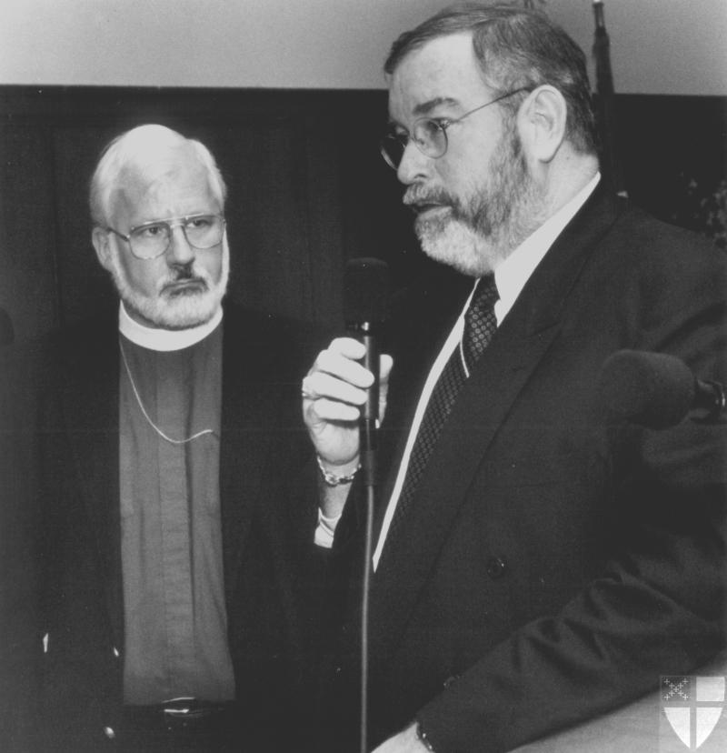 [Rehill addresses press at...]