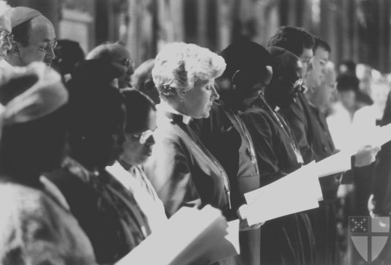 [Female bishops blend into...]