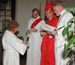 [thumbnail: Anne Williams signs the d...]